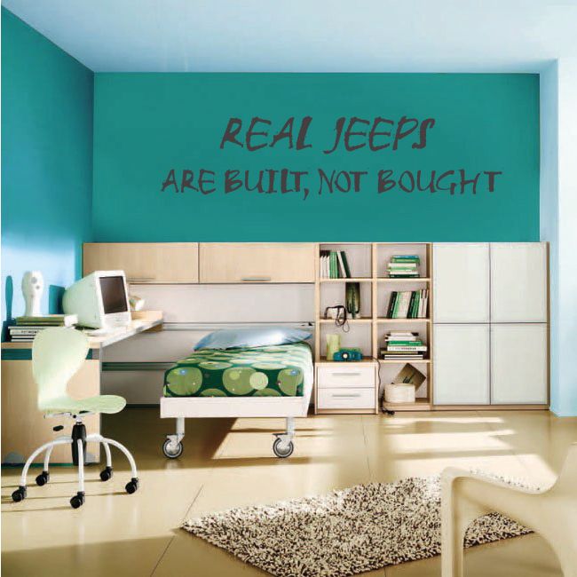 Wall decal with bold handwritten text: “REAL JEEPS ARE BUILT, NOT BOUGHT”