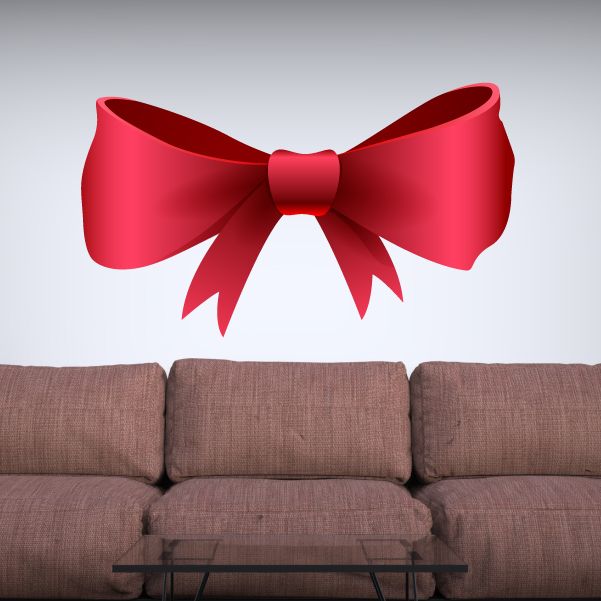 Red vinyl ribbon wall decal with large bow and hanging tail ends