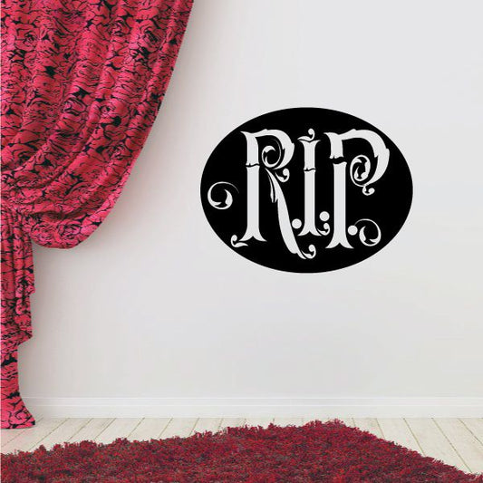 Oval black decal with ornate white RIP lettering