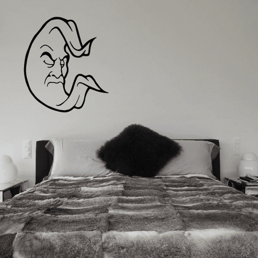 Resting moon face decal with black line art of a sleeping face in a crescent moon