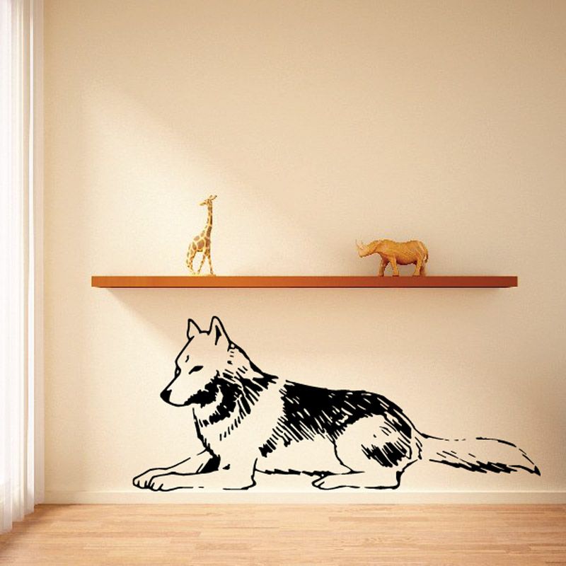 Resting timber wolf wall decal in black-and-white line art