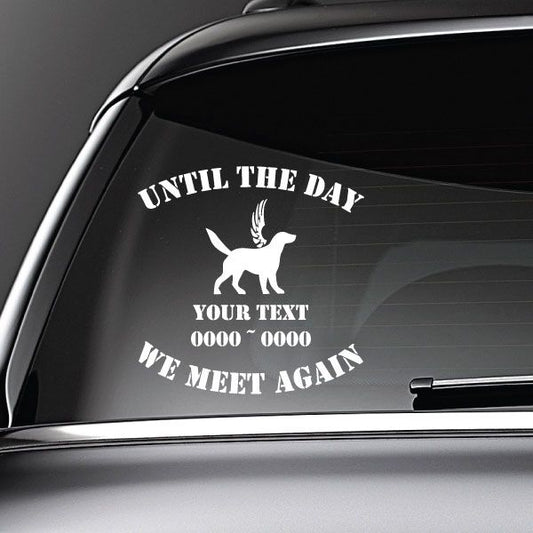 Car decal with white dog-with-wings icon and 'WE MEET AGAIN' text