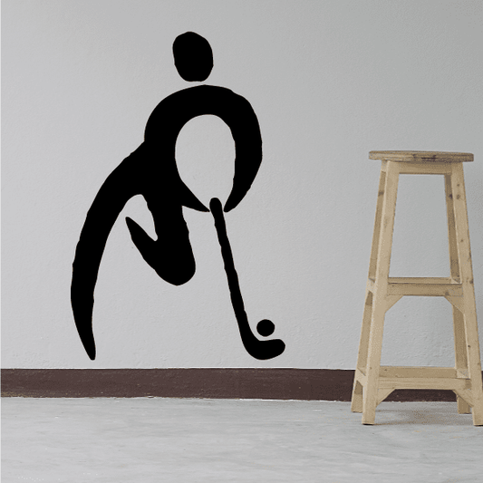 Field hockey player wall decal, black silhouette holding a stick