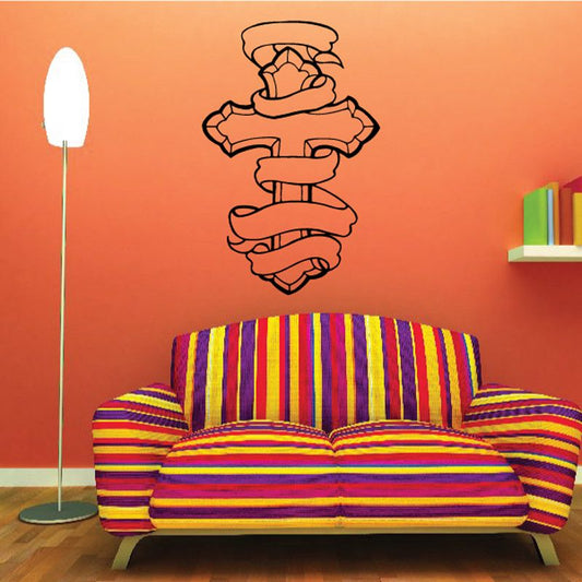 Vinyl wall decal featuring angel wings and cross outline