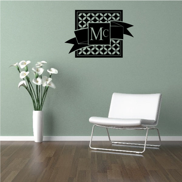 Ribbon monogram decal with letters Mc, black ribbon and patterned frame
