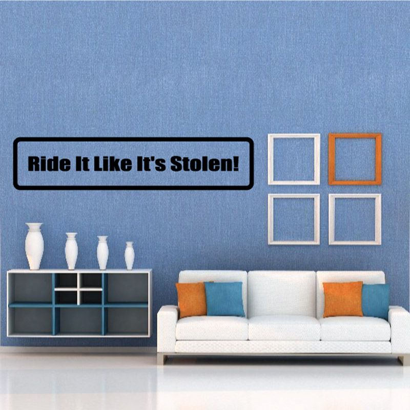 Ride like it’s stolen! vinyl wall decal with black outline and white text