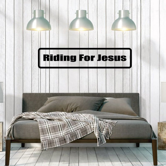 Riding for Jesus wall decal with bold black and white text on white rectangle