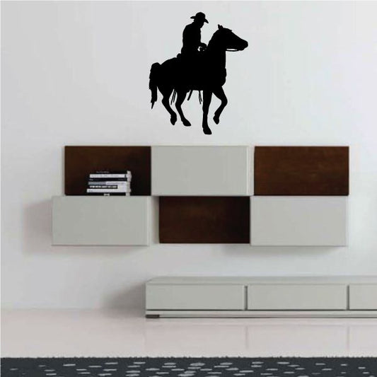 Black cowboy riding horse wall decal
