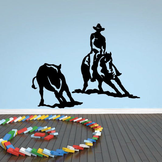 Cowboy on horse and bull decal, black silhouette of rider, horse, and bull