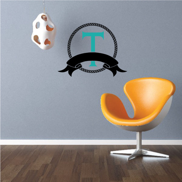 Rope monogram sticker with letter T in teal and black ribbon banner