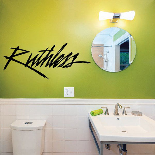 Black wall decal with stylized script lettering