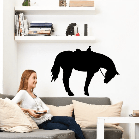 Horse balancing wall decal with black silhouetted horse figure