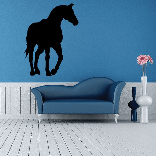 Horse decal with black silhouette in standing pose, curious look