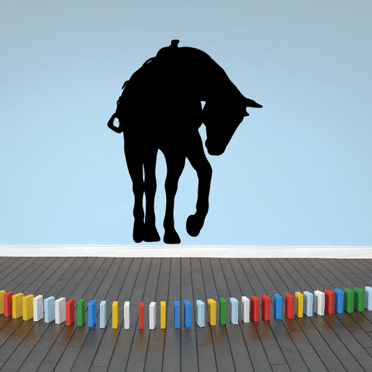 Black horse kicking ground wall decal with solid black horse silhouette