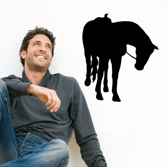 Horse looking over decal with saddle, black silhouette