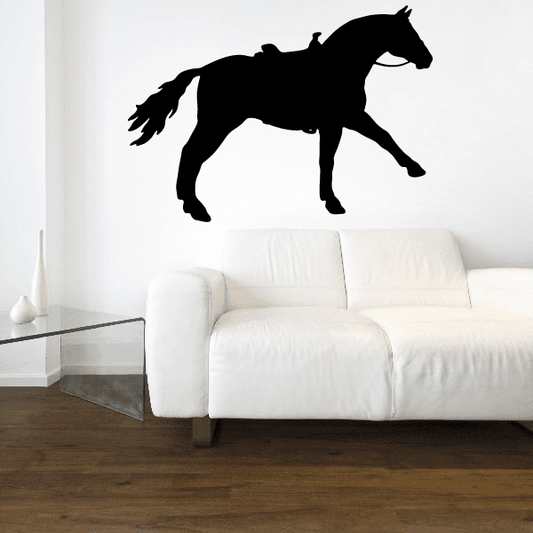 Black walking horse decal with saddle silhouette
