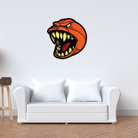 Basketball wall decal: orange basketball with snarling black mouth and yellow teeth