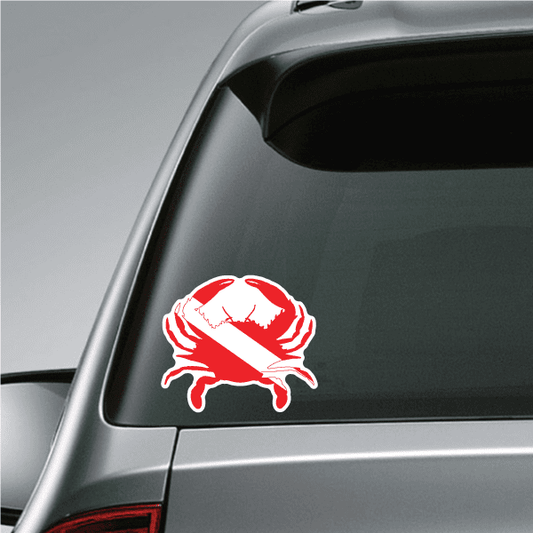 Red-and-white crab scuba sticker on car window