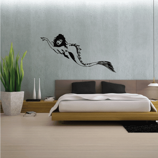 Sea monster mermaid wall decal in black, flying figure with long tail