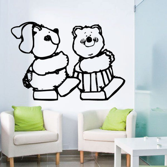 Vinyl decal sticker of two black-and-white cartoon dogs sitting, removable wall decor