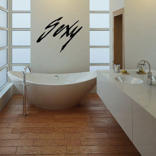 Black script wall decal with 'Sexy' lettering