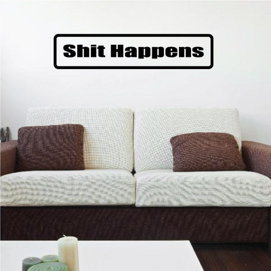 Wall decal with bold text “Shit Happens” inside black rounded border