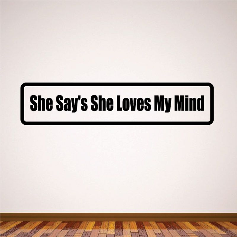 Black and white wall decal with text 'She Says She Loves My Mind'