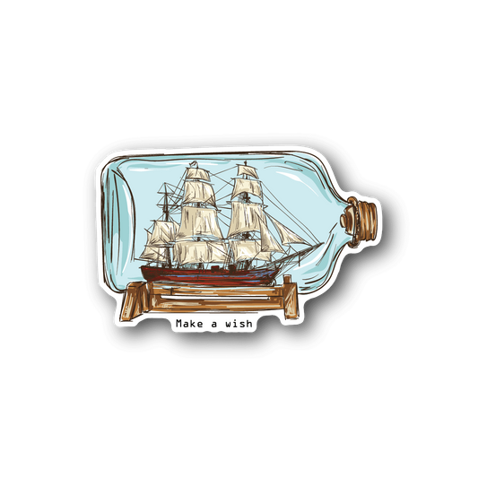 Vinyl sticker showing a sailboat in a bottle, brown cork, and Make a wish text