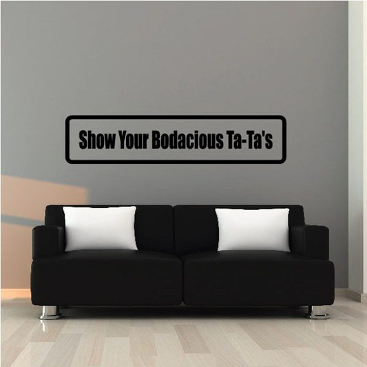 Wall decal with “Show Your Bodacious Ta-Tas” in bold white letters on black outline