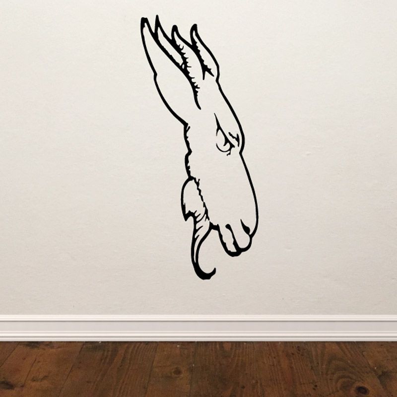 Side goat head decal, black outline of a facing-left goat head on a light background