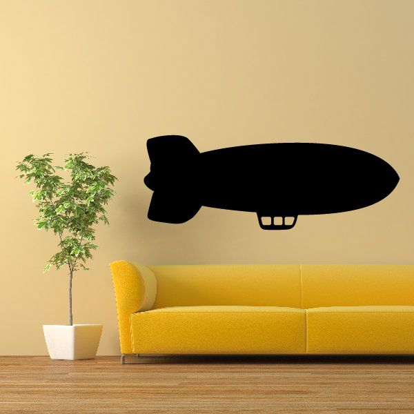 Black blimp wall decal with small window details and rounded tail fin