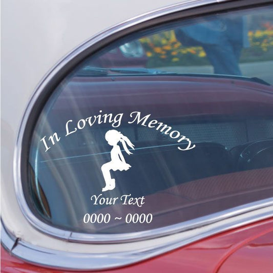 Car decal with sitting girl silhouette and 'In Loving Memory' text.