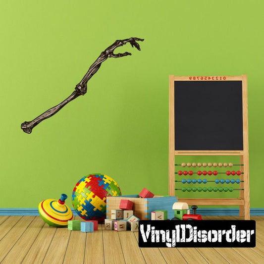 Skeleton arm bone wall decal with raised jointed bones in dark gray