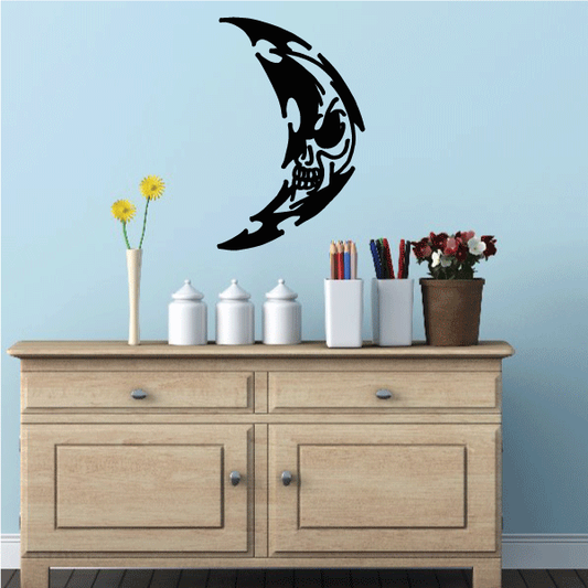 Moon decal with black skeleton face illustration