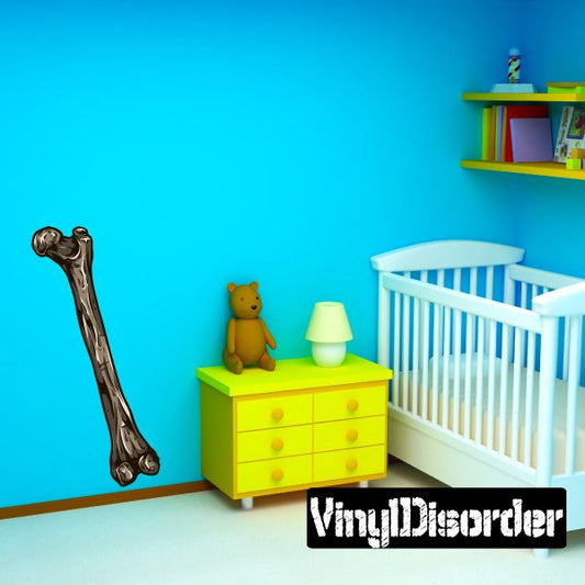 Leg bone skeleton decal, tall silver-gray bone shape with black outline
