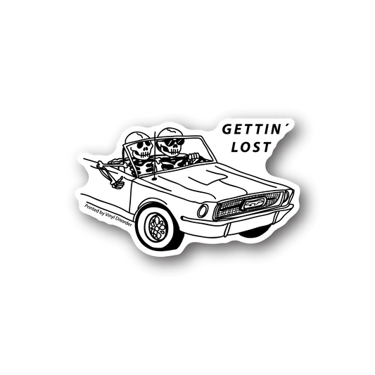 Skeleton vinyl sticker with two skulls in a car, 'GETTING LOST' text