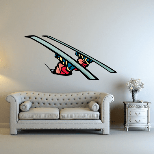 Skiing wall decal: blue skis with colorful skier cartoon, die-cut vinyl sticker