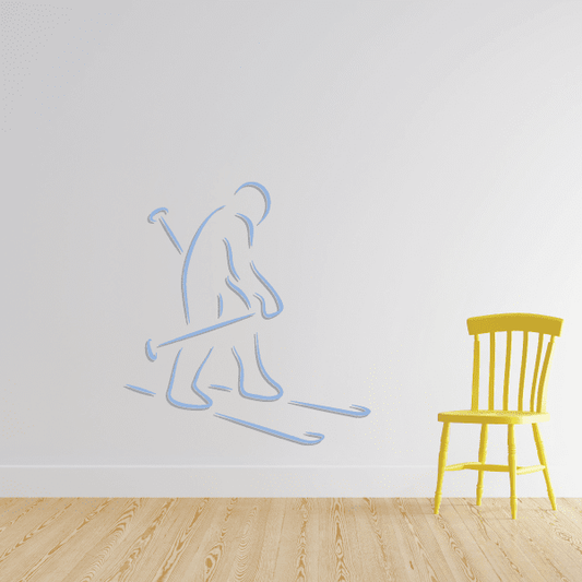 Skiing vinyl wall decal sticker, blue skier and skis on clear background