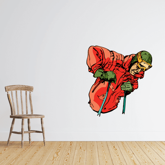Colorful cartoon skier vinyl wall decal, red jacket and green helmet, mid-ski pose