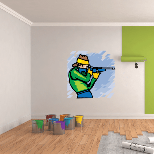 Skiing wall decal sticker of a cartoon skier aiming a rifle in blue burst