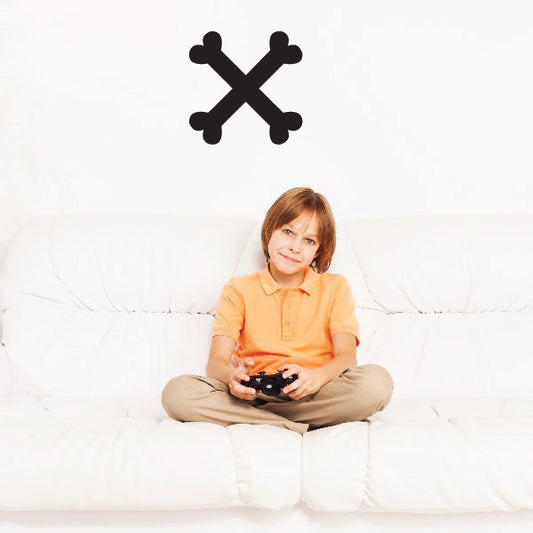 Crossbones wall decal in black, crossed bone shapes