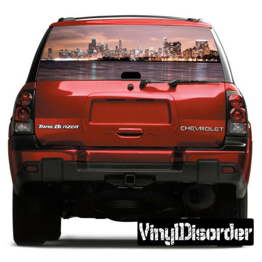 Red SUV rear window skyline graphic print over the rear glass