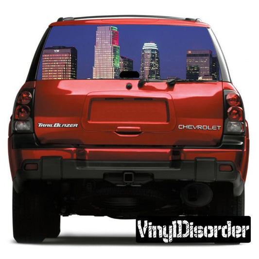 Red SUV rear view with Los Angeles skyline graphic on rear window