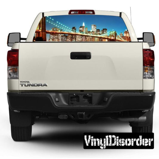 Rear window skyline graphic for pickup truck, colorful city lights view