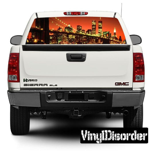 Vehicle rear window graphic decal with skyline city lights, black background