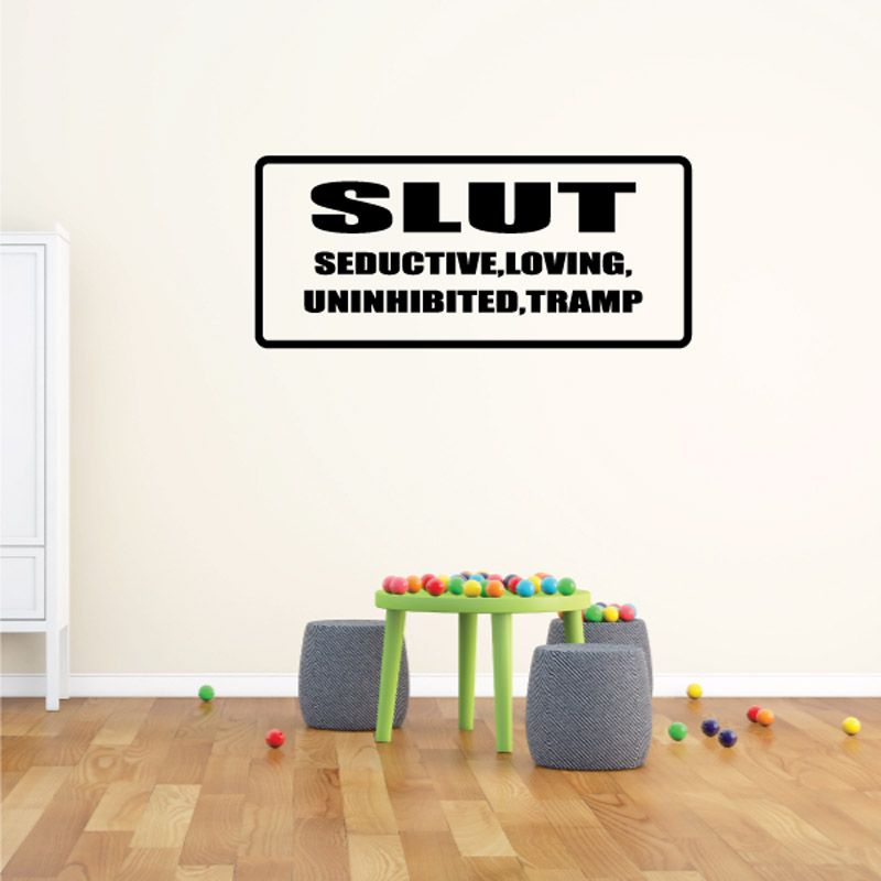 Wall decal with black 'SLUT' and 'SEDUCTIVE, LOVING, UNINHIBITED, TRAMP'