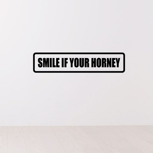 Vinyl decal with black border and “SMILE IF YOUR HORNEY” text