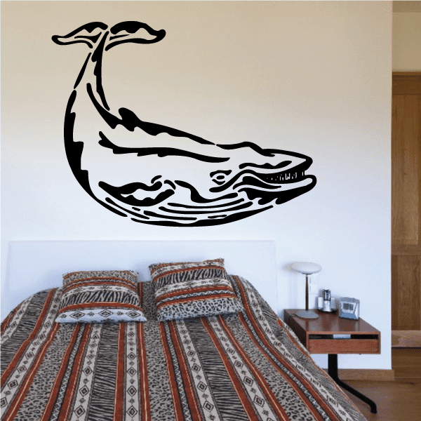 Smiling humpback whale wall decal, black with wave-pattern details