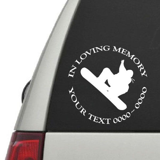 Snowboard decal: 'IN LOVING MEMORY' text with snowboarder silhouette on black