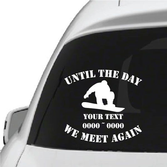 Memorial snowboard decal with white rider silhouette and bold 'WE MEET AGAIN' text